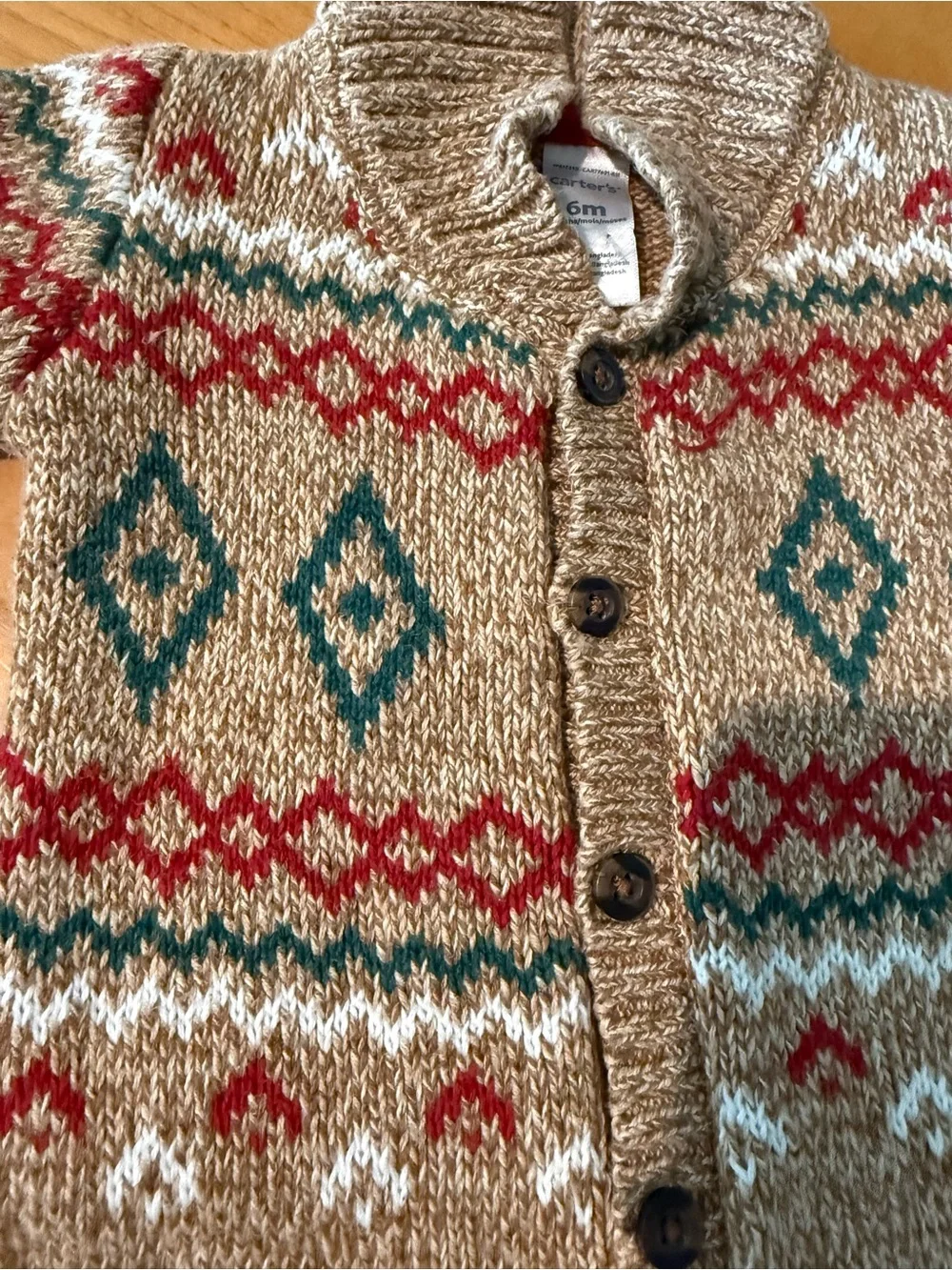 Cartier Beige Knit Fair Isle Baby One-Piece with Red and Teal Accents
